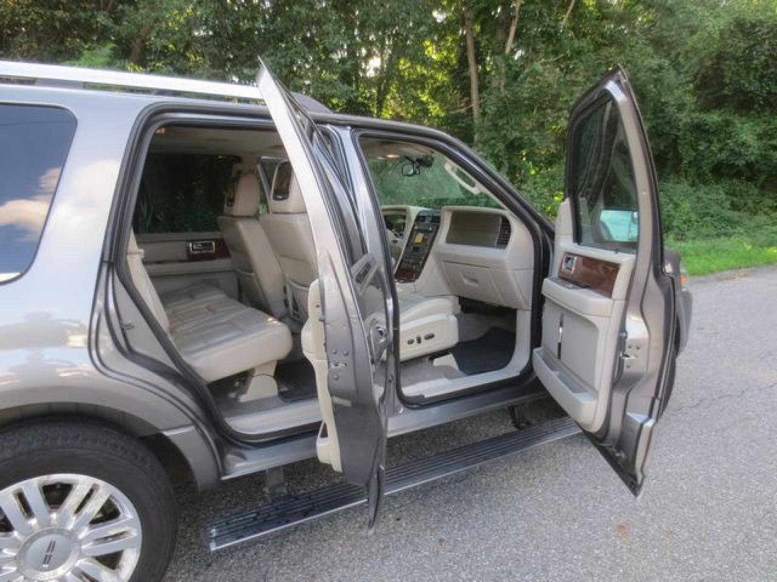 2012 Gray /Tan Lincoln Navigator 4WD (5LMJJ2J54CE) with an 5.4L V8 SOHC 24V engine, 6-Speed Automatic transmission, located at 270 US Route 6, Mahopac, NY, 10541, (845) 621-0895, 41.349022, -73.755280 - Photo #12