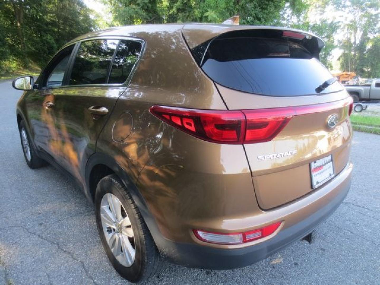 2017 Tan /Black Kia Sportage LX AWD (KNDPMCAC4H7) with an 2.4L V6 DOHC 24V engine, 6A transmission, located at 270 US Route 6, Mahopac, NY, 10541, (845) 621-0895, 41.349022, -73.755280 - Photo#4