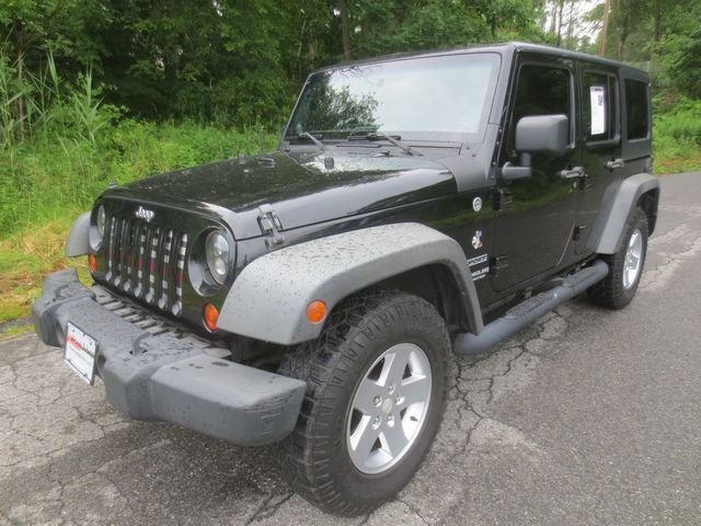 photo of 2011 Jeep Wrangler Unlimited Sport 4WD