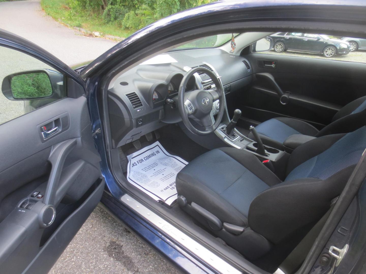 2006 Blue /Black Scion tC Sport Coupe (JTKDE177660) with an 2.4L L4 DOHC 16V engine, 5speed manual transmission, located at 270 US Route 6, Mahopac, NY, 10541, (845) 621-0895, 41.349022, -73.755280 - Photo#6