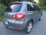 2010 Gray /Black Volkswagen Tiguan SE 4Motion (WVGBV7AX5AW) with an 2.0L L4 DOHC 16V TURBO engine, 6-Speed Automatic transmission, located at 270 US Route 6, Mahopac, NY, 10541, (845) 621-0895, 41.349022, -73.755280 - Photo#3