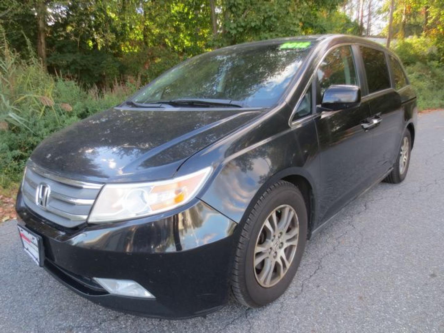 2012 Black /Gray Honda Odyssey EX-L (5FNRL5H64CB) with an 3.5L V6 SOHC 24V engine, 5-Speed Automatic transmission, located at 270 US Route 6, Mahopac, NY, 10541, (845) 621-0895, 41.349022, -73.755280 - Photo#0