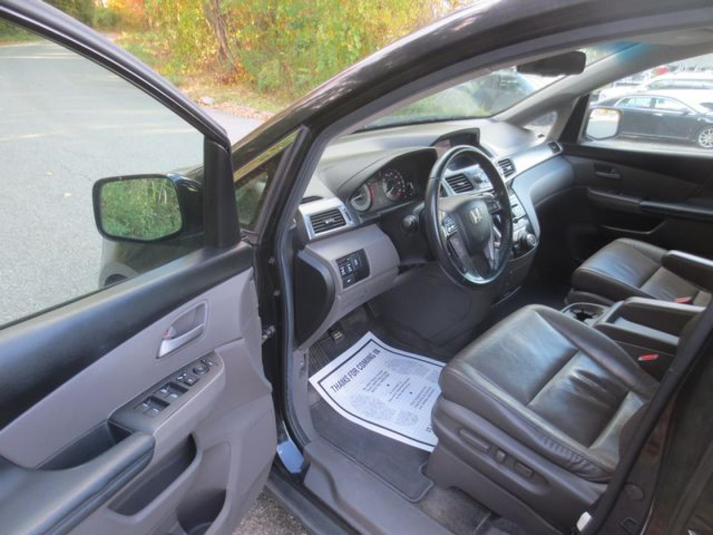 2012 Black /Gray Honda Odyssey EX-L (5FNRL5H64CB) with an 3.5L V6 SOHC 24V engine, 5-Speed Automatic transmission, located at 270 US Route 6, Mahopac, NY, 10541, (845) 621-0895, 41.349022, -73.755280 - Photo#6