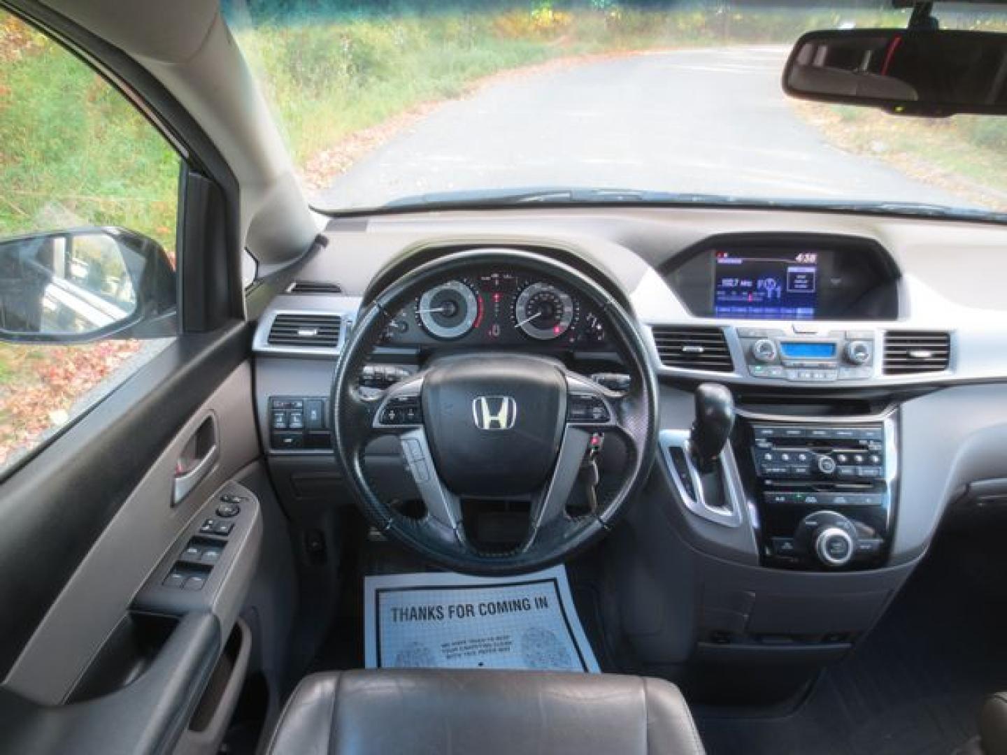 2012 Black /Gray Honda Odyssey EX-L (5FNRL5H64CB) with an 3.5L V6 SOHC 24V engine, 5-Speed Automatic transmission, located at 270 US Route 6, Mahopac, NY, 10541, (845) 621-0895, 41.349022, -73.755280 - Photo#9