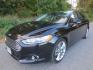 2016 Black /Black Ford Fusion Titanium (3FA6P0D90GR) with an 2.0L L4 DOHC 16V engine, Automatic transmission, located at 270 US Route 6, Mahopac, NY, 10541, (845) 621-0895, 41.349022, -73.755280 - Photo#0