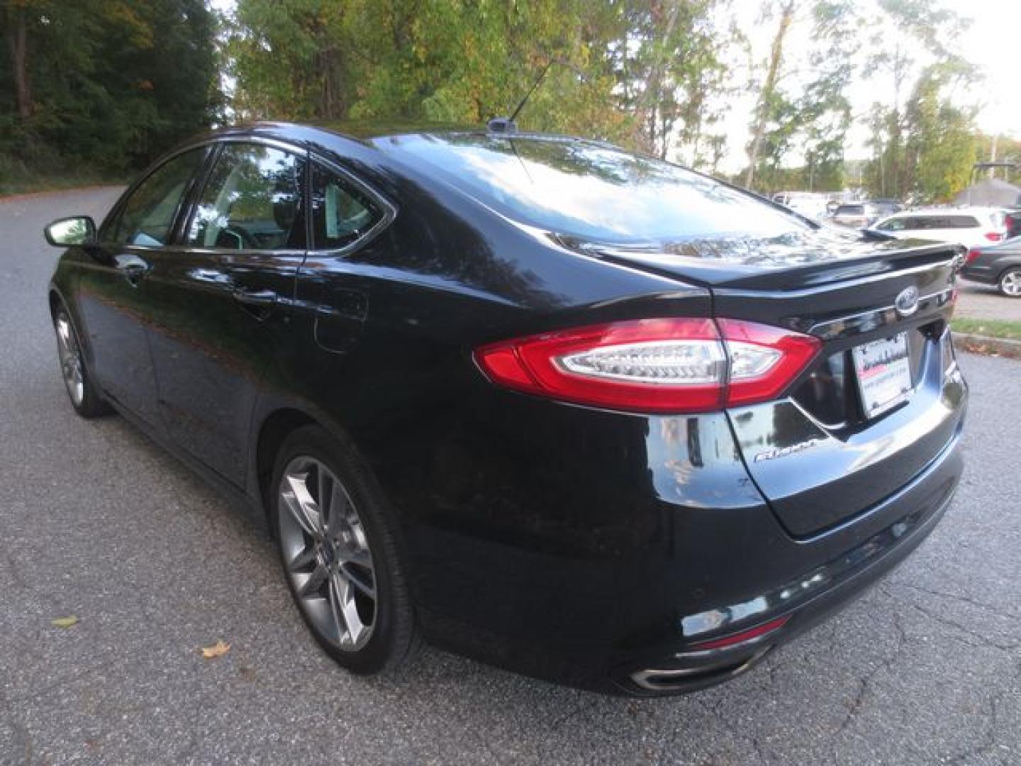 2016 Black /Black Ford Fusion Titanium (3FA6P0D90GR) with an 2.0L L4 DOHC 16V engine, Automatic transmission, located at 270 US Route 6, Mahopac, NY, 10541, (845) 621-0895, 41.349022, -73.755280 - Photo#4