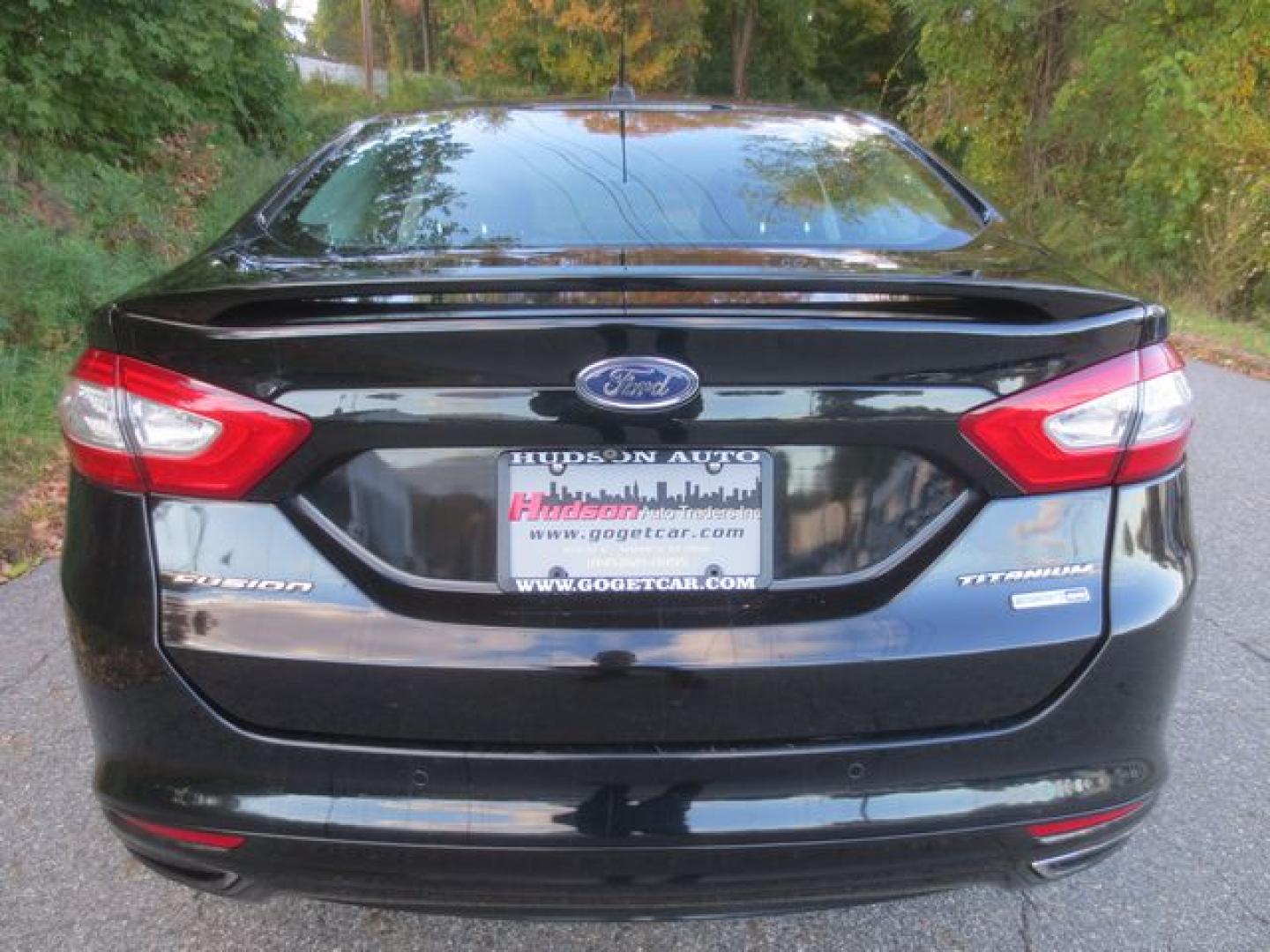 2016 Black /Black Ford Fusion Titanium (3FA6P0D90GR) with an 2.0L L4 DOHC 16V engine, Automatic transmission, located at 270 US Route 6, Mahopac, NY, 10541, (845) 621-0895, 41.349022, -73.755280 - Photo#5