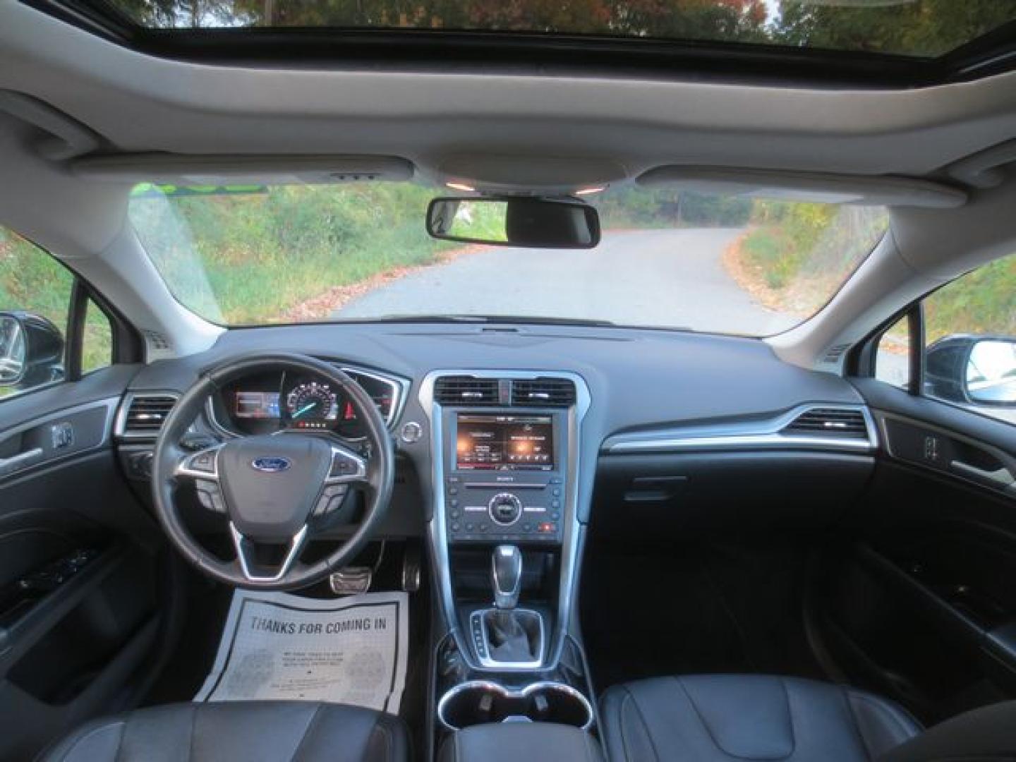 2016 Black /Black Ford Fusion Titanium (3FA6P0D90GR) with an 2.0L L4 DOHC 16V engine, Automatic transmission, located at 270 US Route 6, Mahopac, NY, 10541, (845) 621-0895, 41.349022, -73.755280 - Photo#7