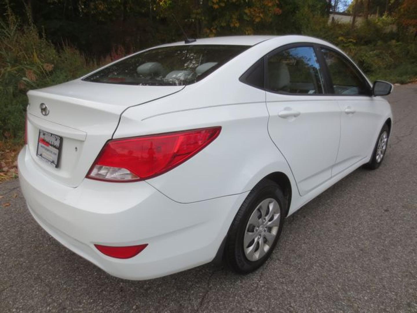 2016 White /Gray Hyundai Accent SE 4-Door 6A (KMHCT4AE7GU) with an 1.6L L4 DOHC 16V engine, 6-SPEED MANUAL transmission, located at 270 US Route 6, Mahopac, NY, 10541, (845) 621-0895, 41.349022, -73.755280 - Photo#3