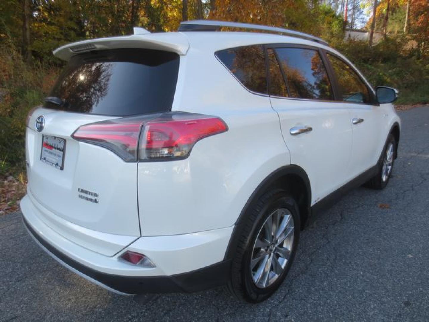 2016 White /Gray/Black Toyota RAV4 Hybrid Limited (JTMDJREV7GD) with an 2.5L L4 DOHC 16V HYBRID engine, Automatic transmission, located at 270 US Route 6, Mahopac, NY, 10541, (845) 621-0895, 41.349022, -73.755280 - Photo#4