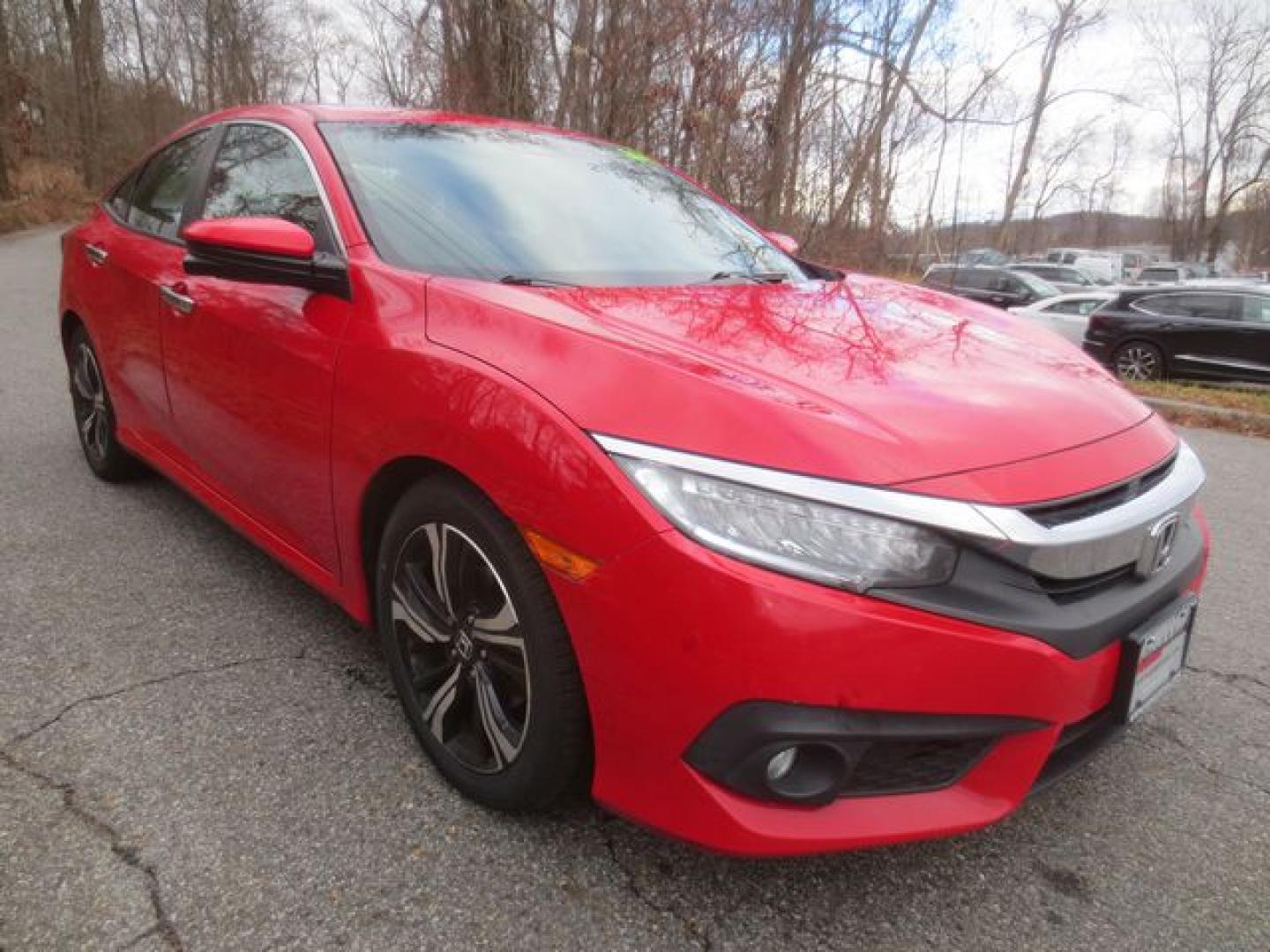 2017 Red /Black Honda Civic Touring (2HGFC1F95HH) with an 1.5L L4 DOHC 16V TURBO engine, Automatic transmission, located at 270 US Route 6, Mahopac, NY, 10541, (845) 621-0895, 41.349022, -73.755280 - Photo#1