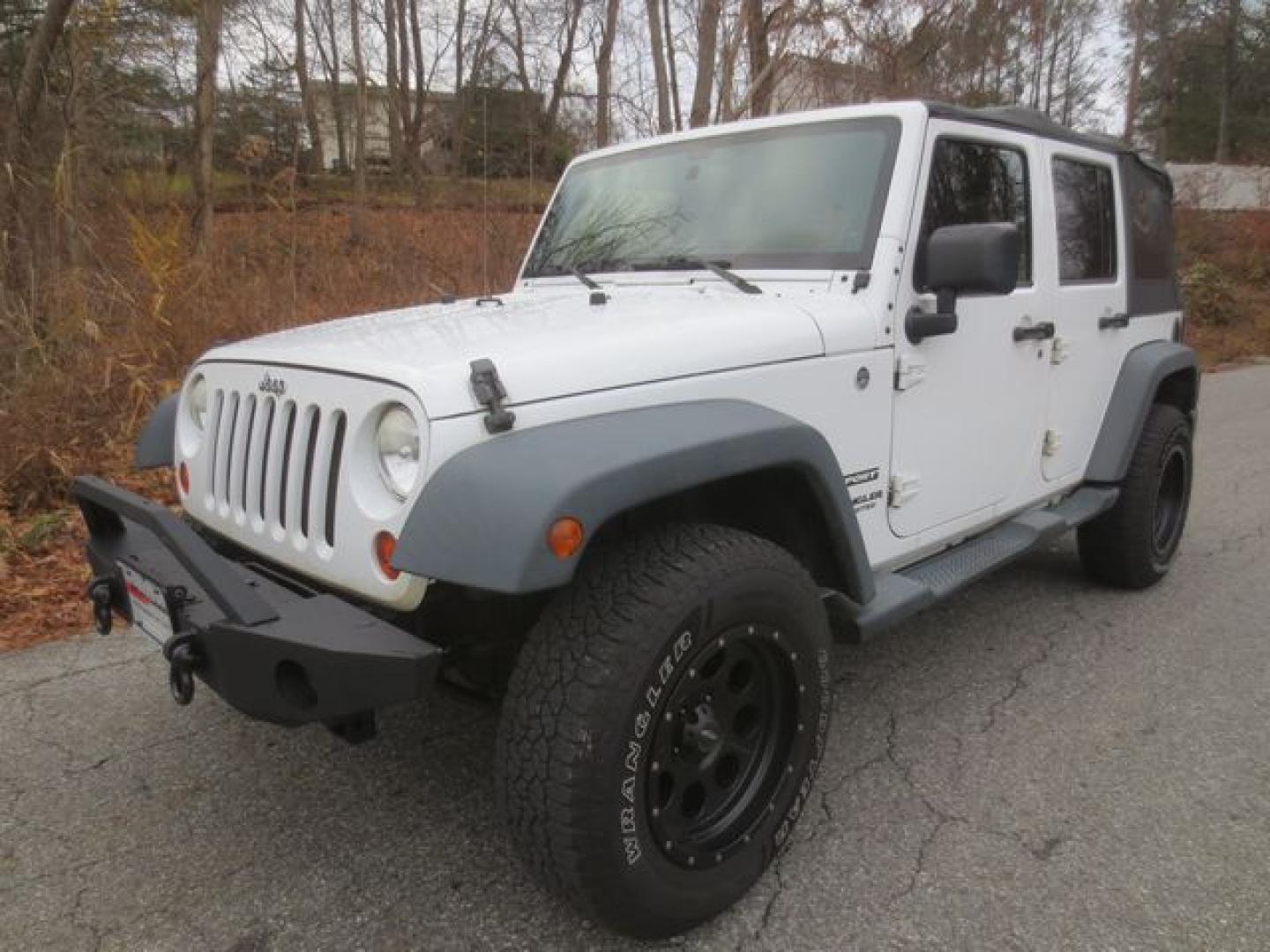 2013 White /Black Jeep Wrangler Unlimited Sport 4WD (1C4BJWDG3DL) with an 3.6L V6 DOHC 24V FFV engine, 6 Speed Manual transmission, located at 270 US Route 6, Mahopac, NY, 10541, (845) 621-0895, 41.349022, -73.755280 - Photo#0