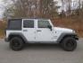 2013 White /Black Jeep Wrangler Unlimited Sport 4WD (1C4BJWDG3DL) with an 3.6L V6 DOHC 24V FFV engine, 6 Speed Manual transmission, located at 270 US Route 6, Mahopac, NY, 10541, (845) 621-0895, 41.349022, -73.755280 - Photo#9