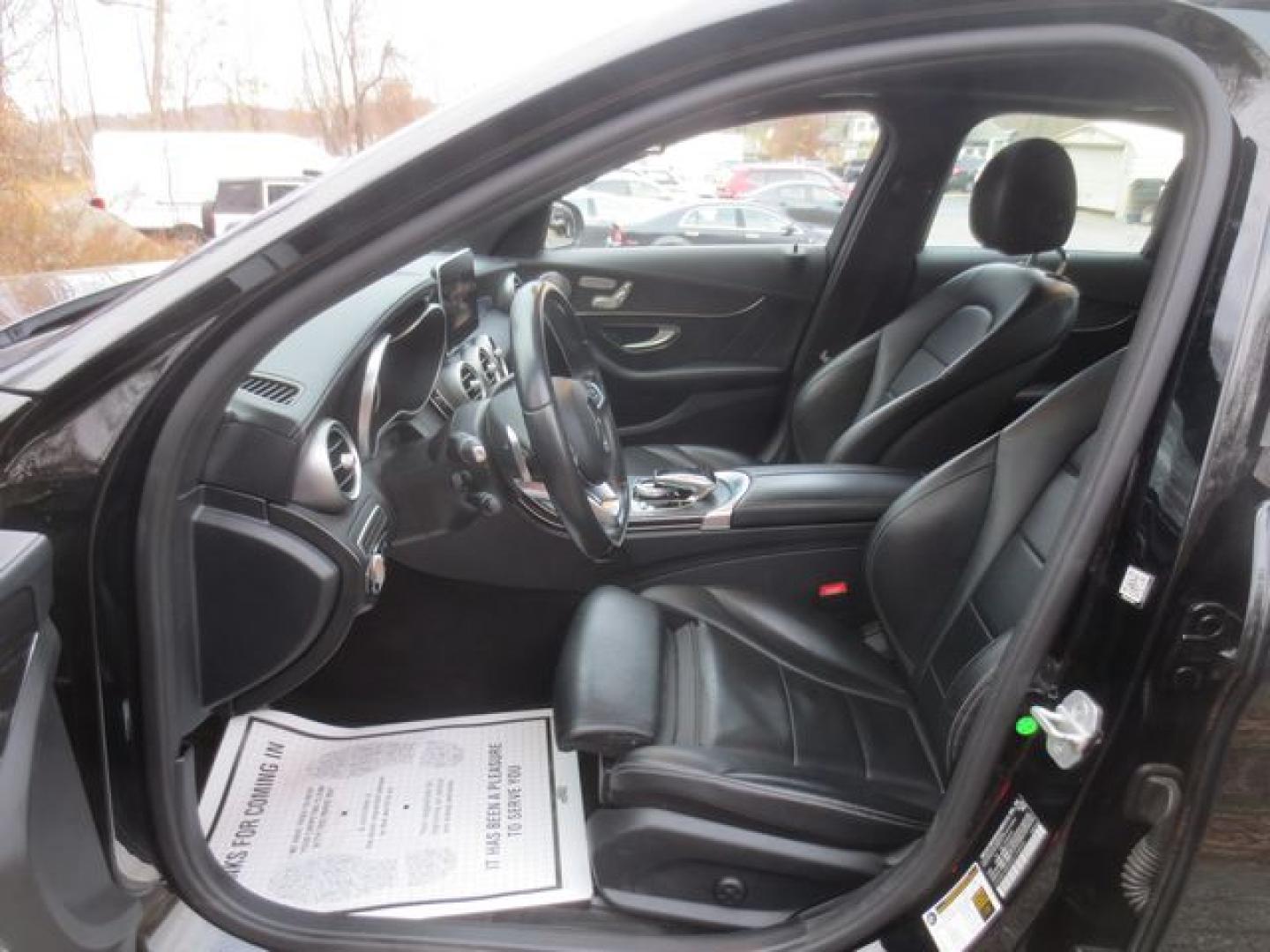 2016 Black /Black Mercedes-Benz C-Class (55SWF4KB3GU) with an 2.0L L4 DOHC 16V TURBO engine, Automatic 7 Speed transmission, located at 270 US Route 6, Mahopac, NY, 10541, (845) 621-0895, 41.349022, -73.755280 - Photo#9