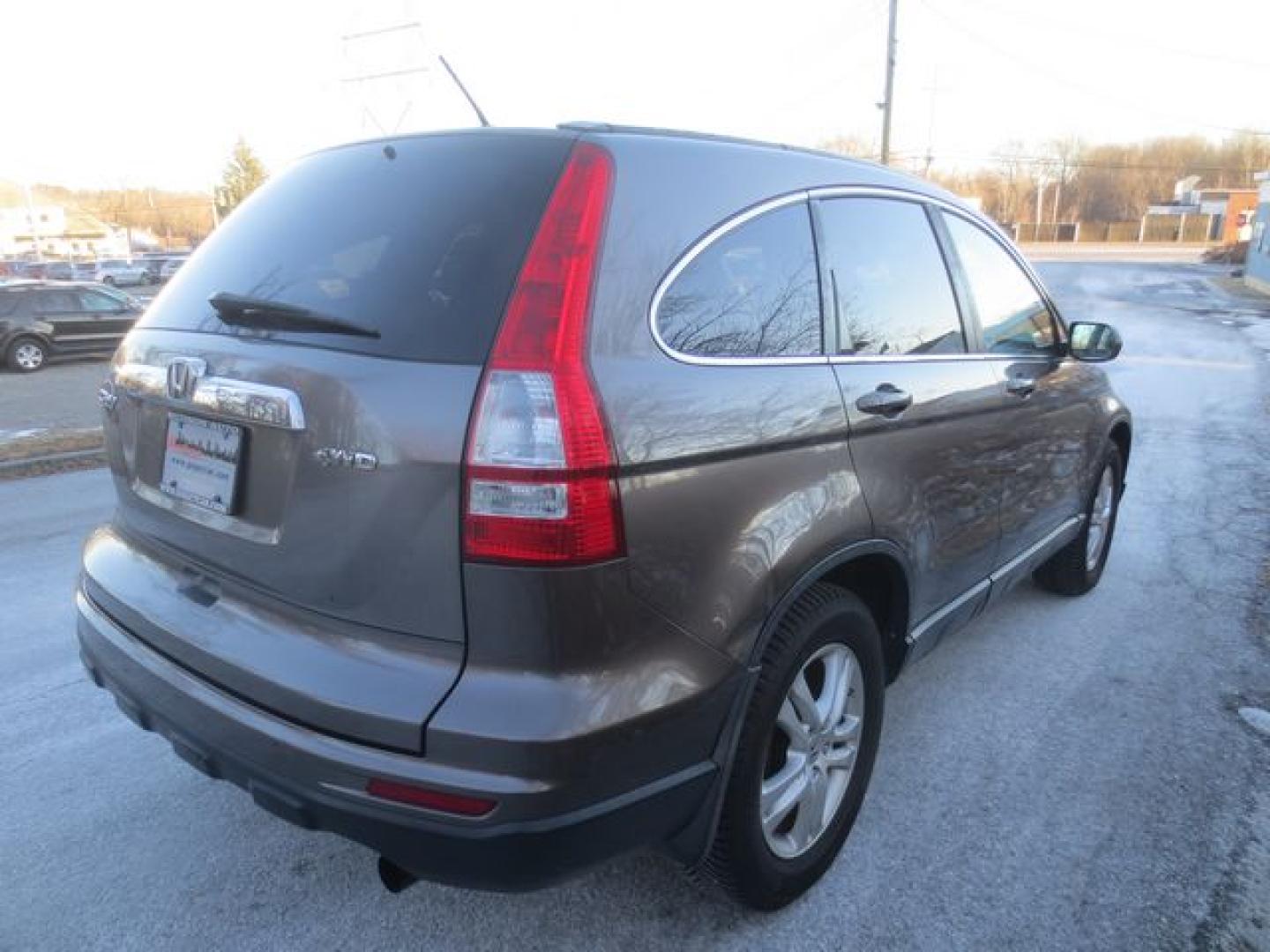 2010 Cinnamon Brown Pearl /Black Honda CR-V EX-L (5J6RE4H79AL) with an 2.4L L4 DOHC 16V engine, 5-Speed Automatic transmission, located at 270 US Route 6, Mahopac, NY, 10541, (845) 621-0895, 41.349022, -73.755280 - Photo#1